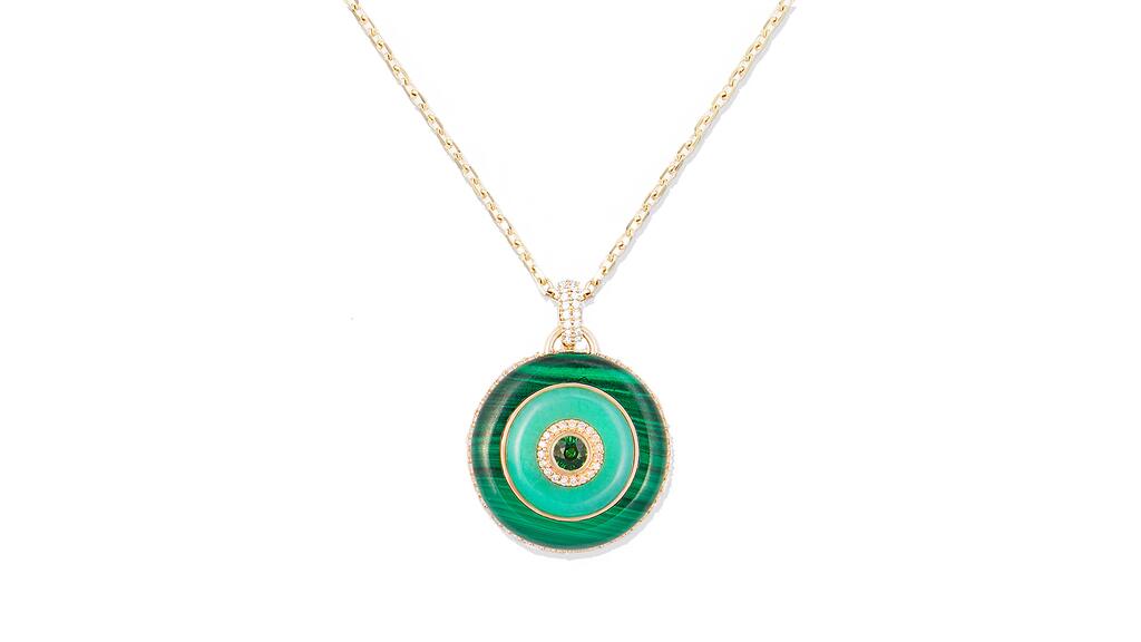 The “Evolve” inlay disc pendant necklace from Campbell + Charlotte in 14-karat gold with malachite, chrysoprase, tsavorite, and diamond ($9,670) Evolve Inlay Disk Pendant Necklace